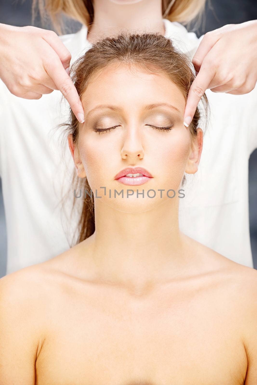 Pretty woman on head massage treatment