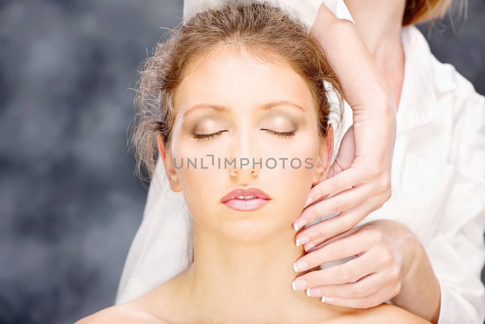Pretty woman on head massage treatment