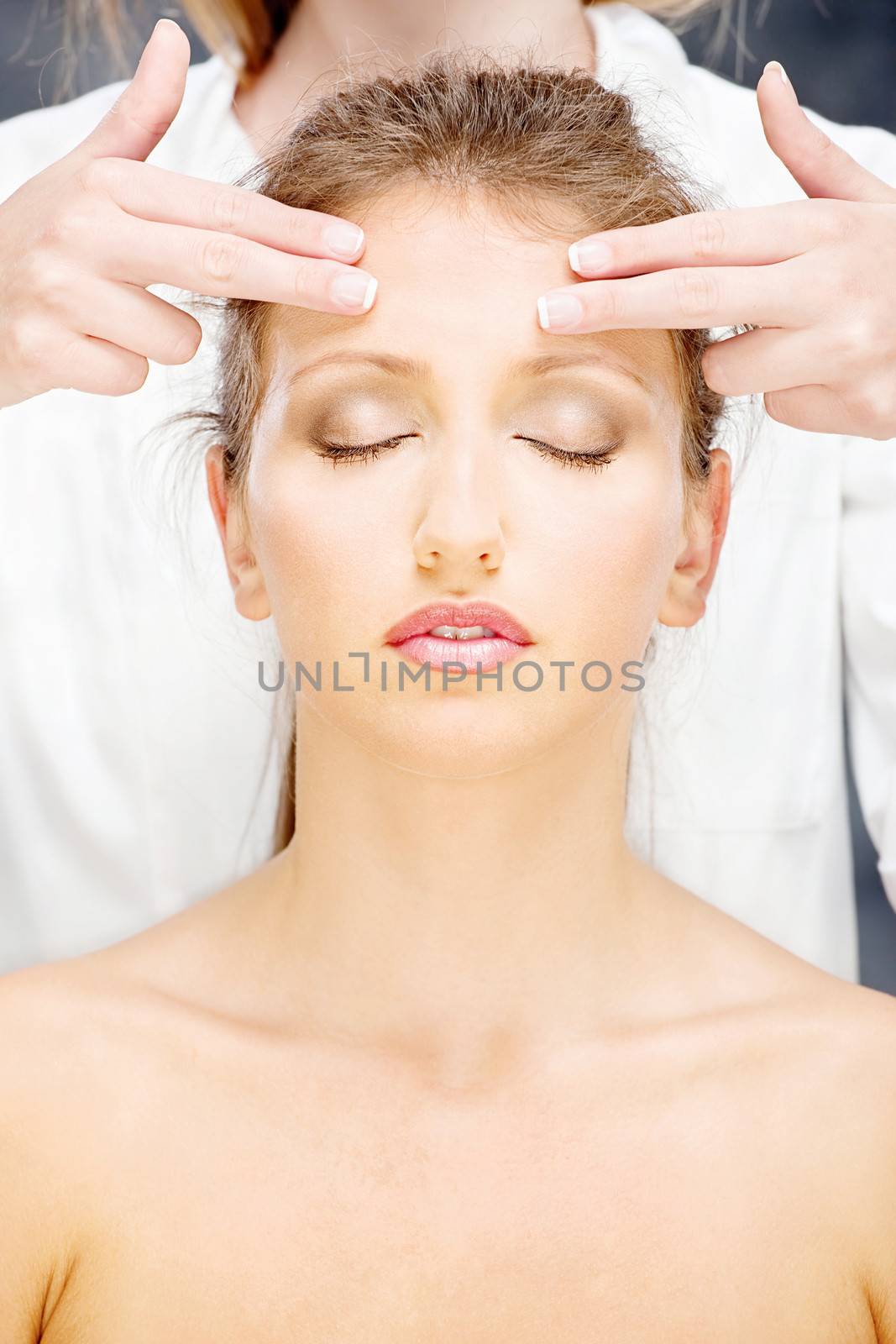 woman on head massage by imarin