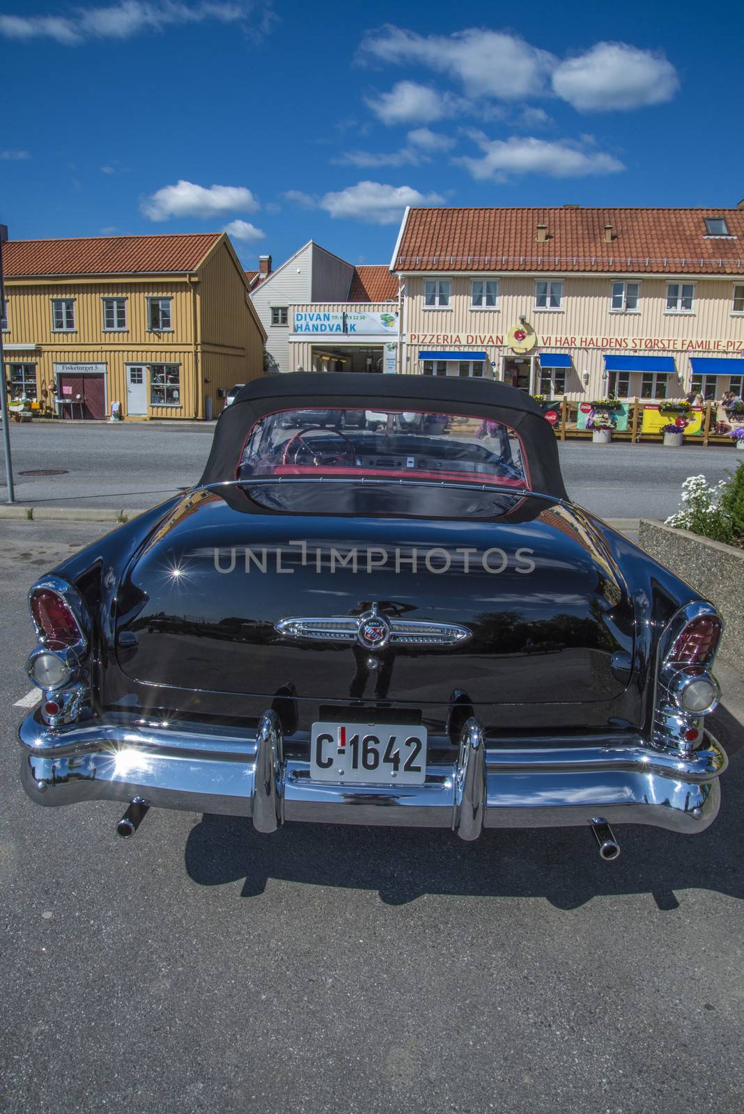 The photo is shot at the fish market in Halden, Norway.