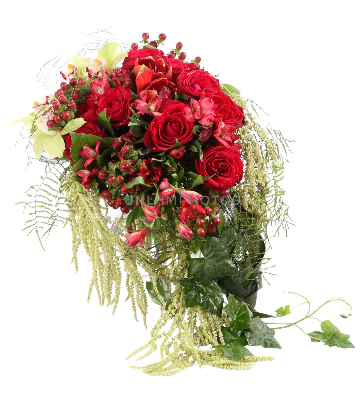 Floral composition with red roses and decorative Hypericum. Flower Arrangement. Isolated image on white background.