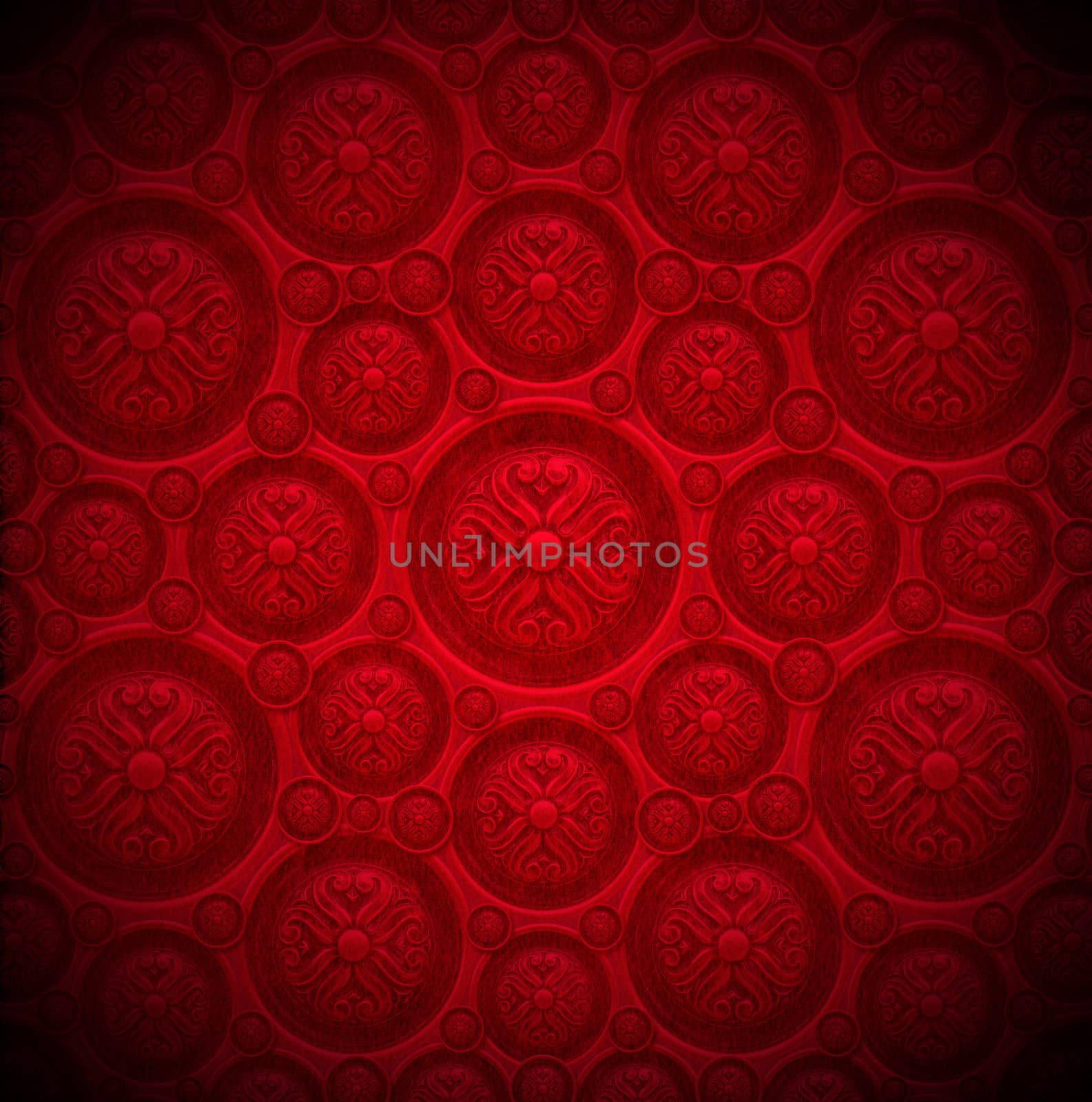 Closeup detail of aged red velvet texture background with classic ornament