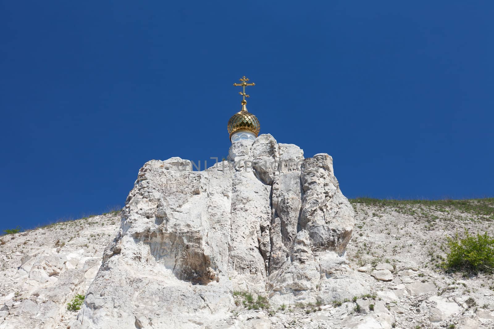 cave temple in Divnogorsky Sacred Uspenskom a man's monastery against the sky