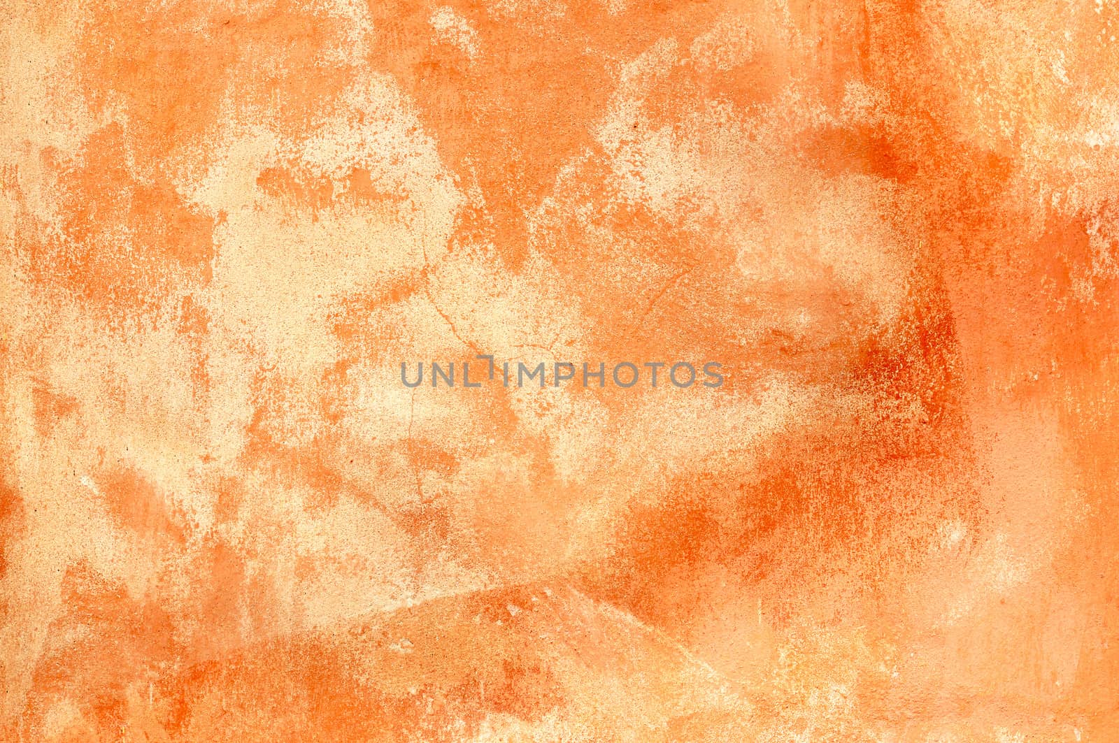 Rough, old plastered wall in brick orange