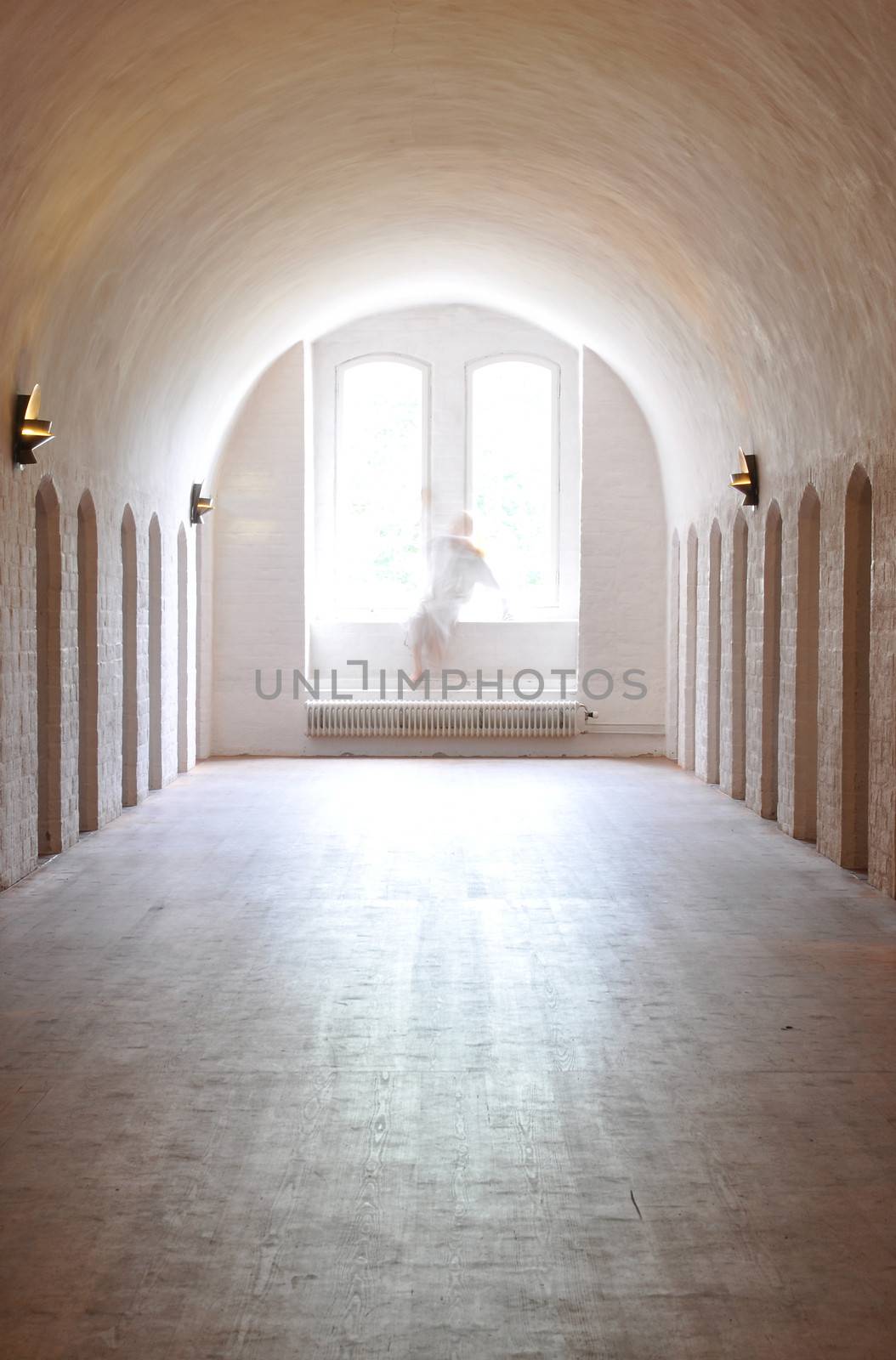 Woman ghost in an old lunatic asylum