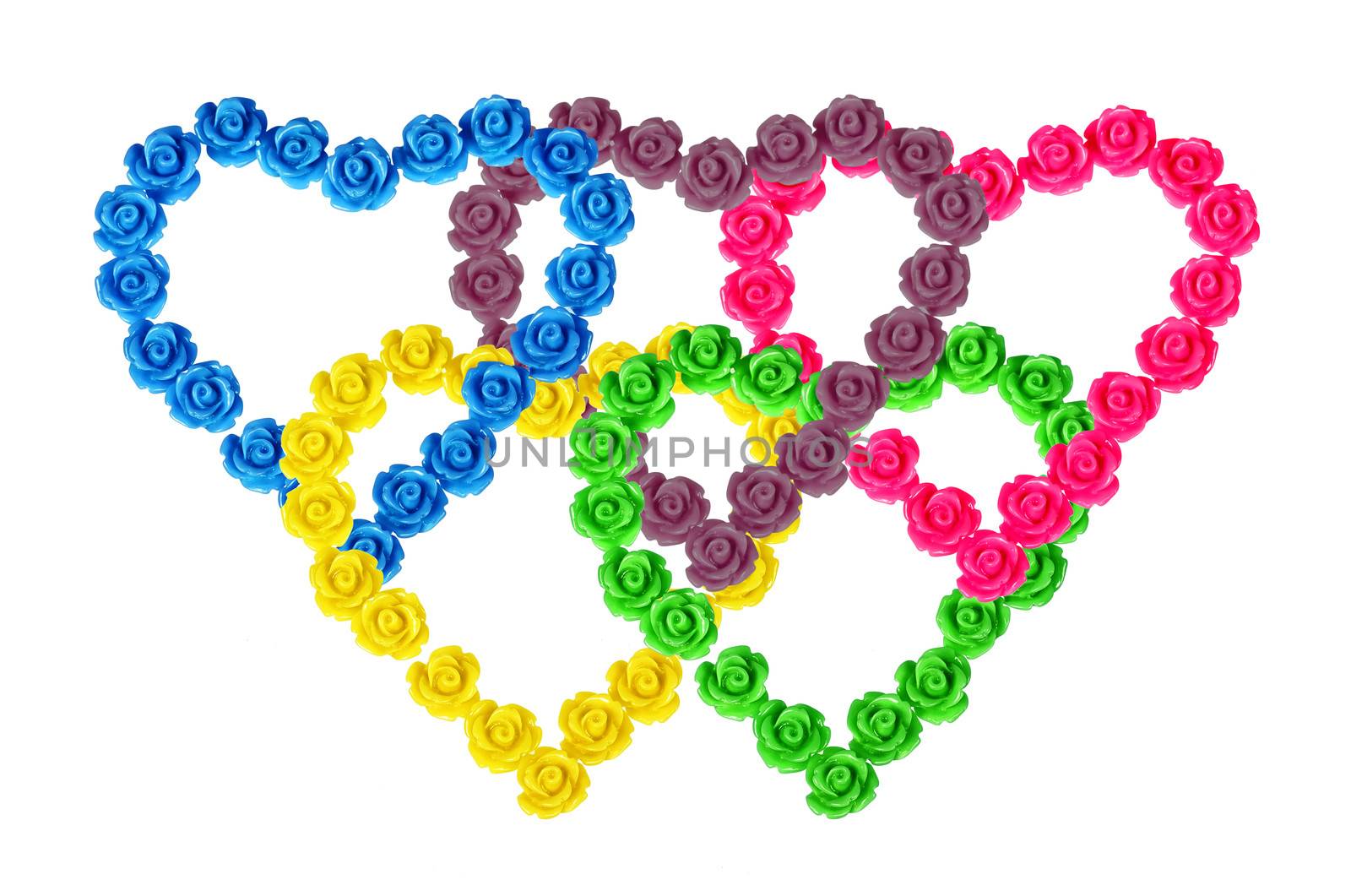 Flowers laid out in the form of hearts. The analogy of the Olympic rings. Isolated on white background. collage