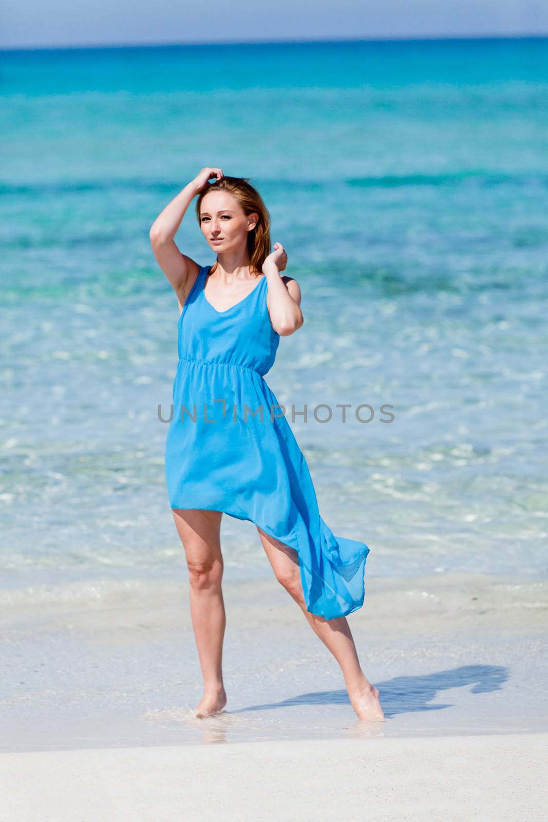 beautful happy woman on the beach lifestyle summertime by juniart