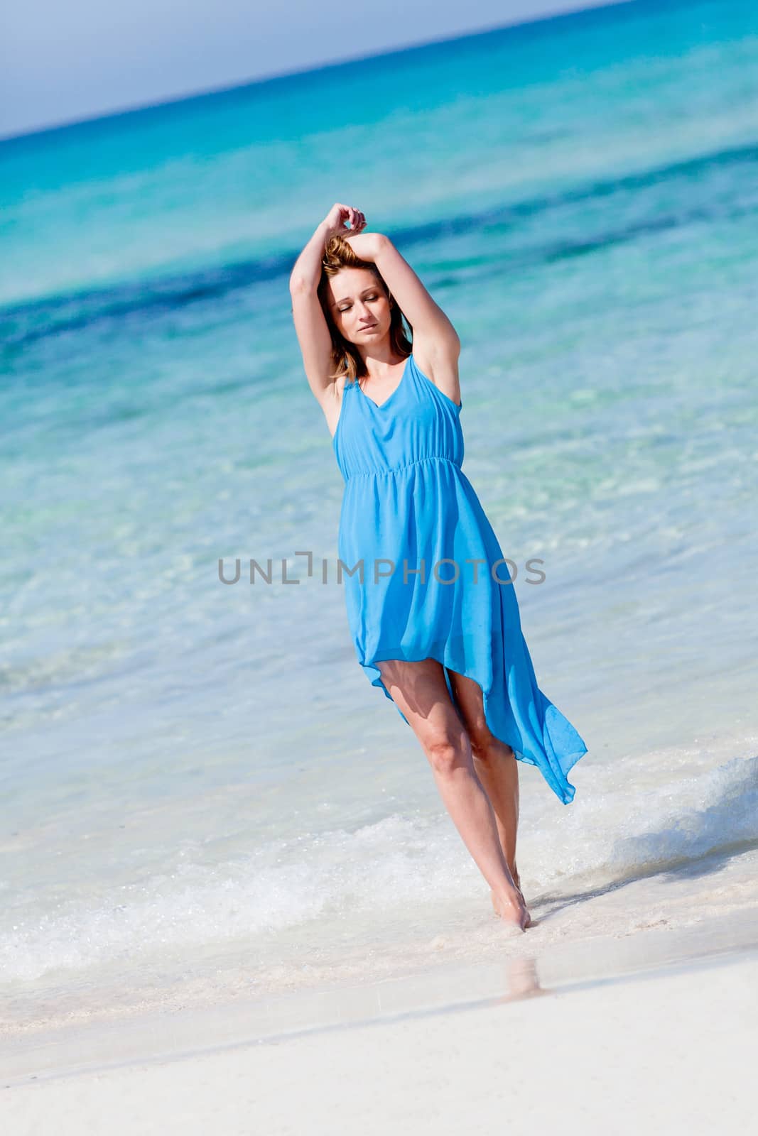 beautful happy woman on the beach lifestyle summertime by juniart