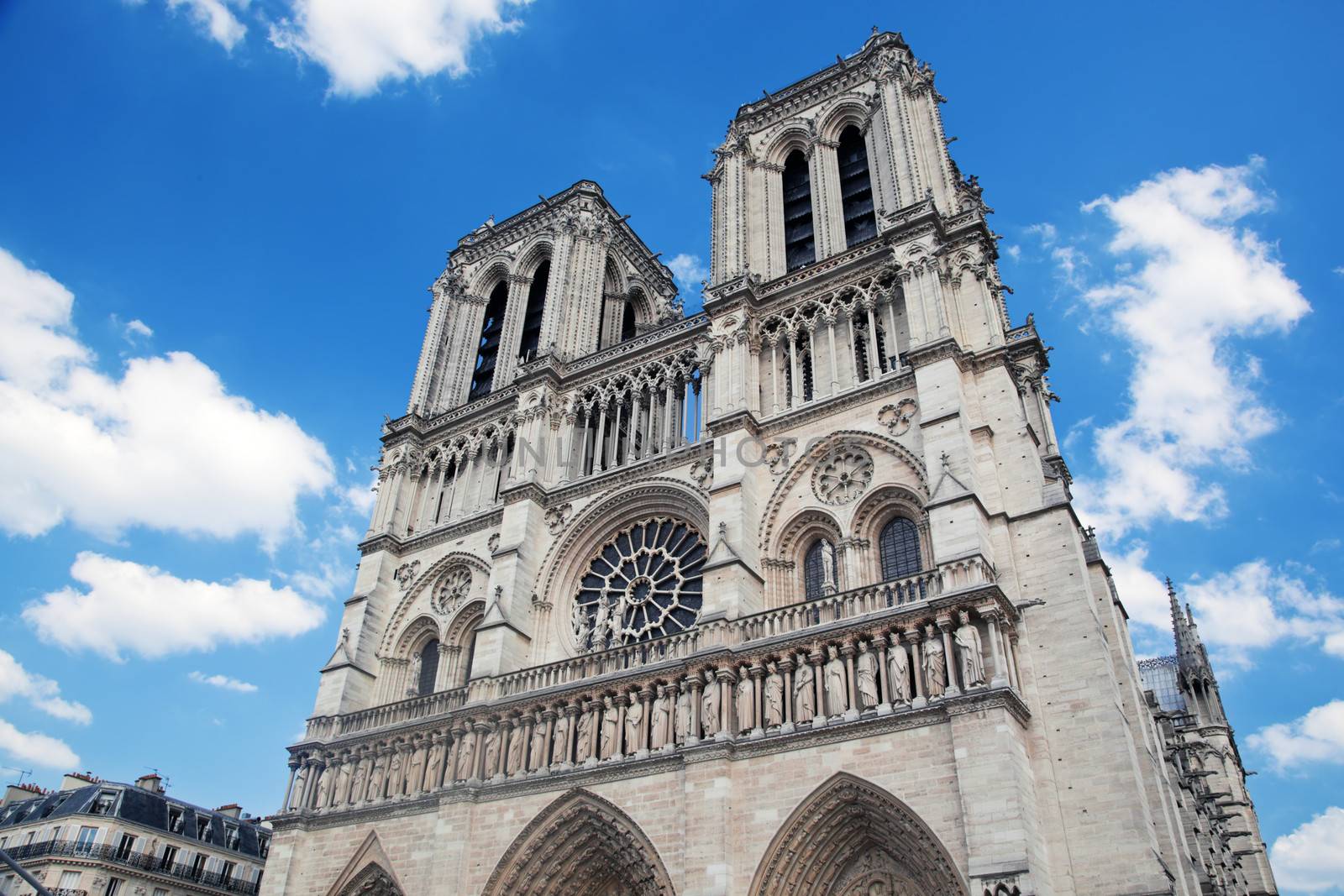 Notre Dame Cathedral, Paris, France. Main facade view. Famous Paris tourist attraction