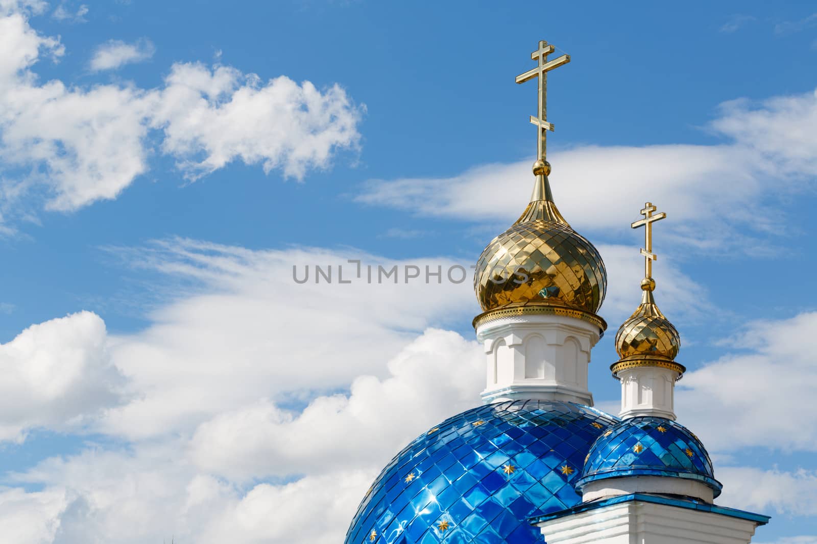 Domes of the church on sky background
