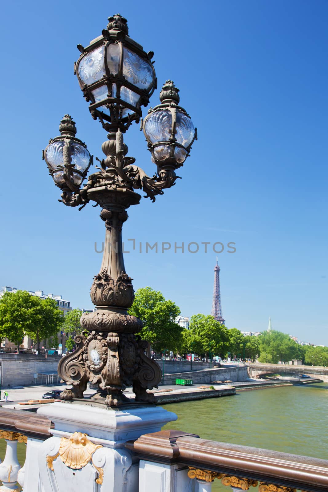 Eiffel Tower and bridge on Seine river in Paris, Fance. by photocreo