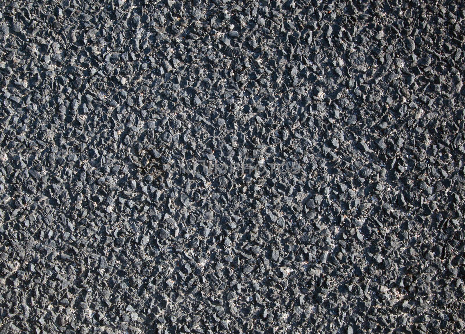 Asphalt road surface background. Good as a texture or design element