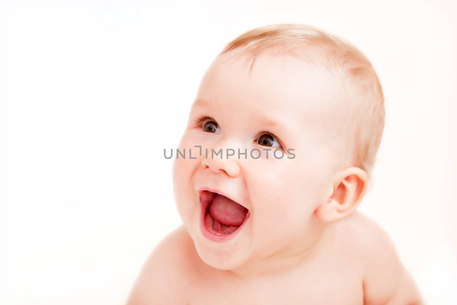 Cute happy baby laughing on white by photocreo