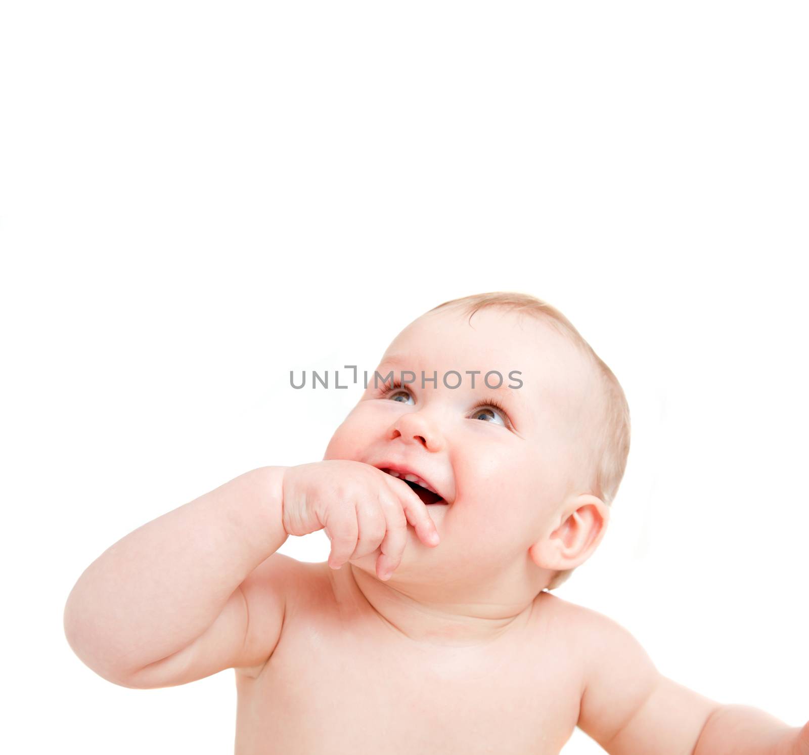 Cute happy baby smiling and looking above. White background copy-space