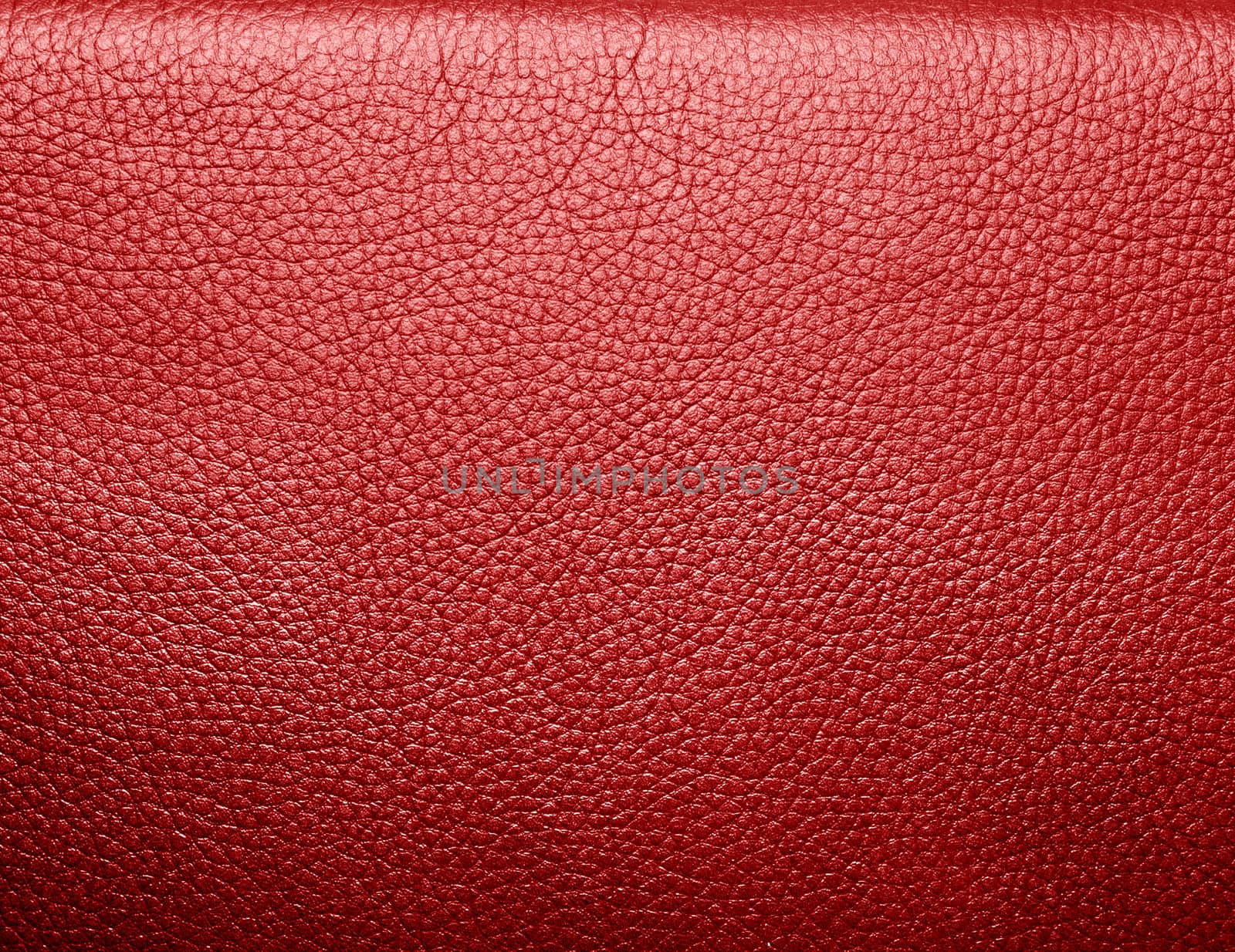 Soft wrinkled red leather. Texture or background with copyspace, high resolution
