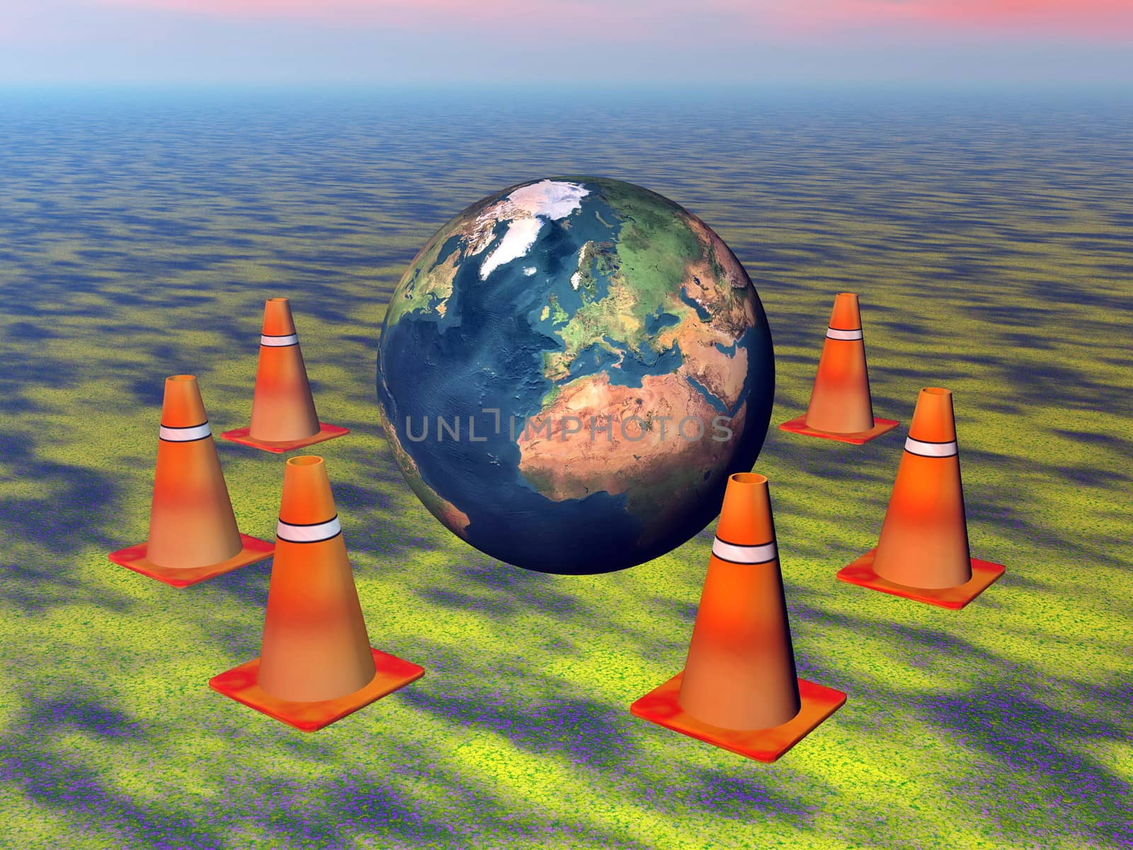 Globe surrounded with orange traffic cones on green grass