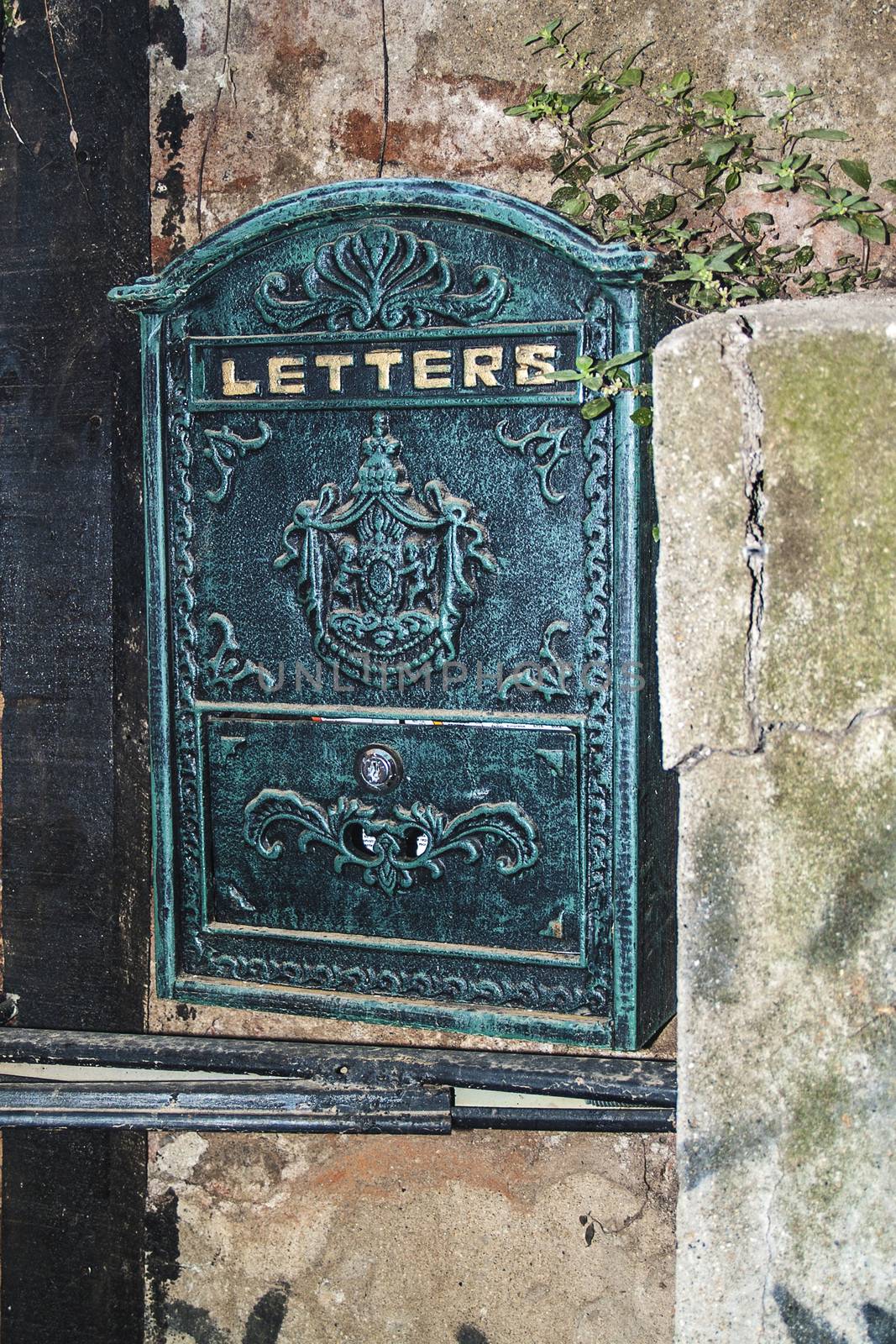 Ancient letters box on metal in a particular house