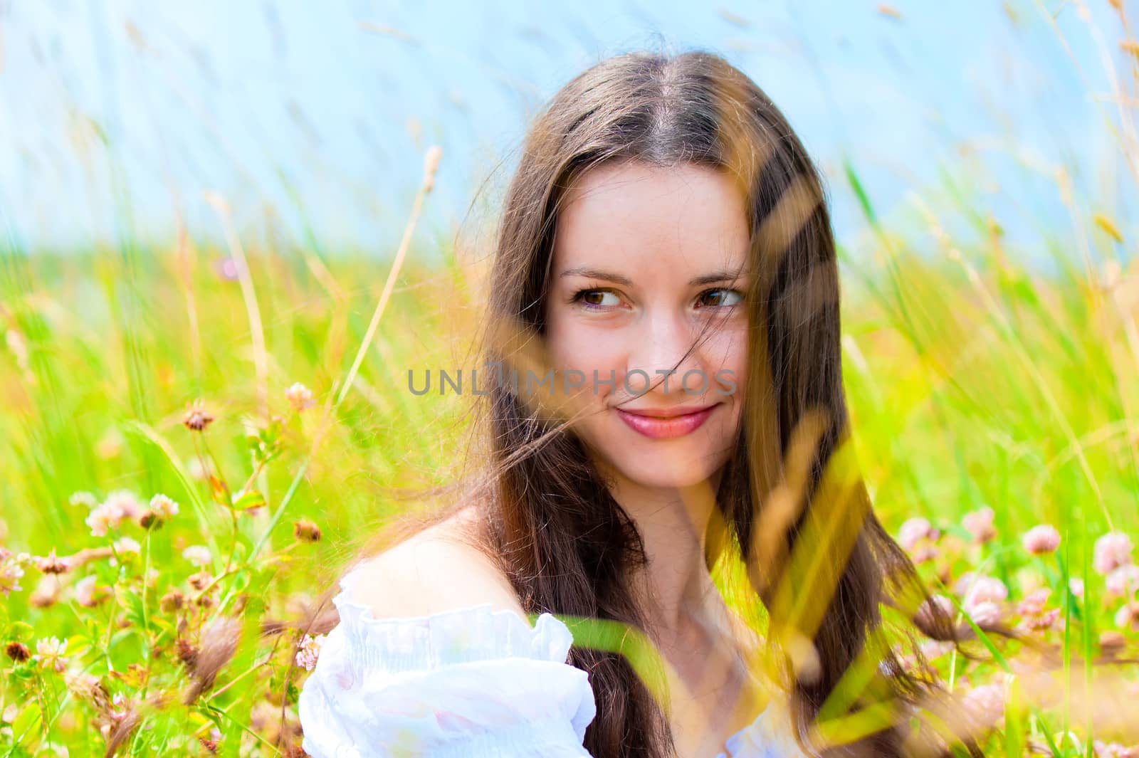 beautiful young girl in a field of flowers by kosmsos111