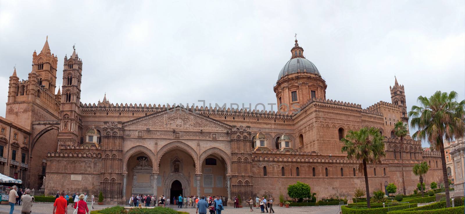 Palermo, Italy - May 2, 2011: Crowds of tourists visit main cathedral in Palermo - Cattedrale di Vergine Assunta; Madre Chiesa. Sicily, Italy