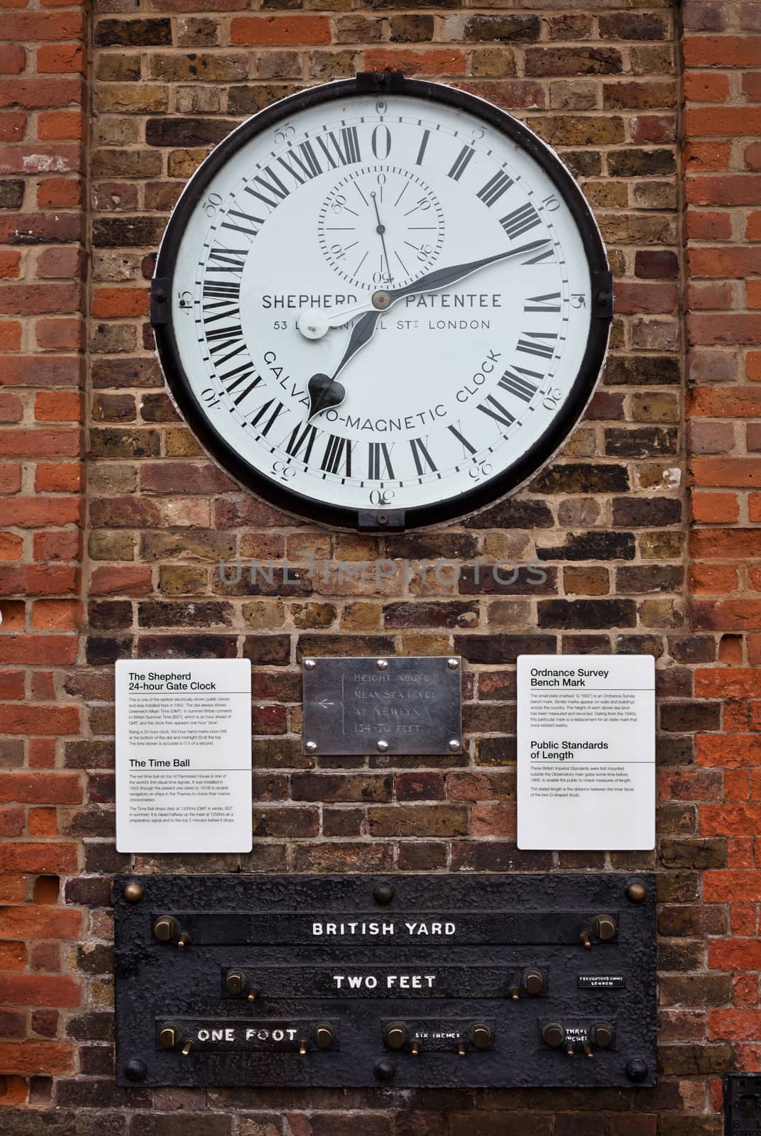 Clock at the gates of Royal Observatory in Greenwich