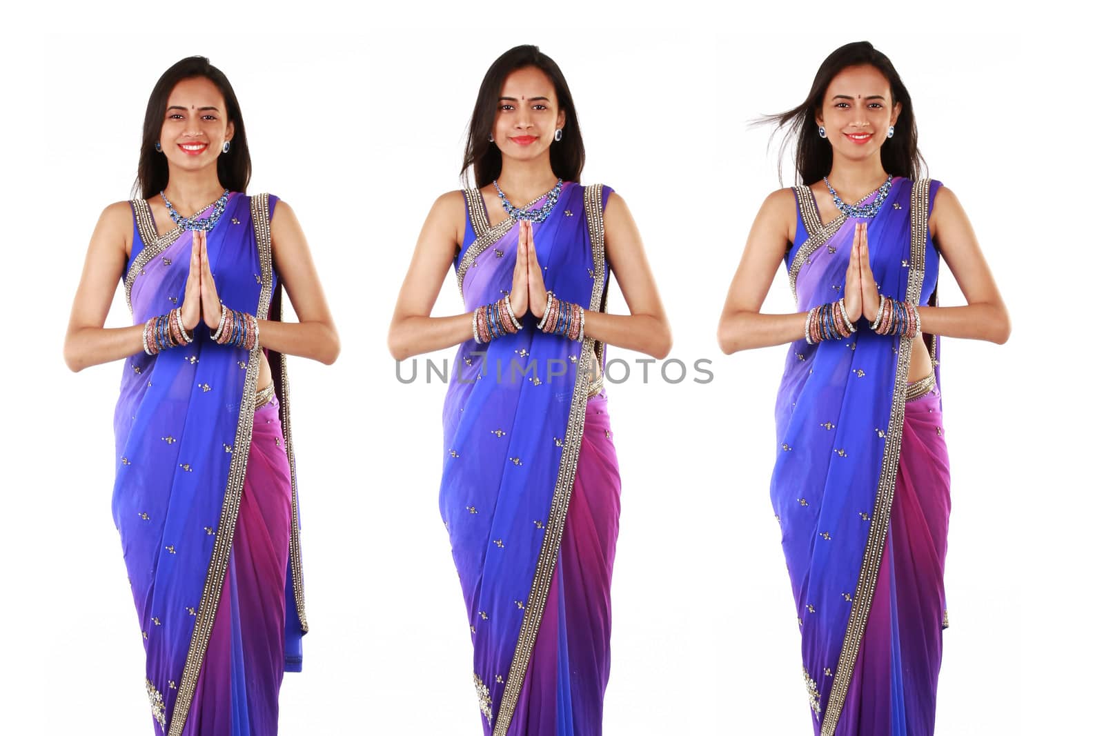 Indian woman in traditional clothing. Isolated on white.