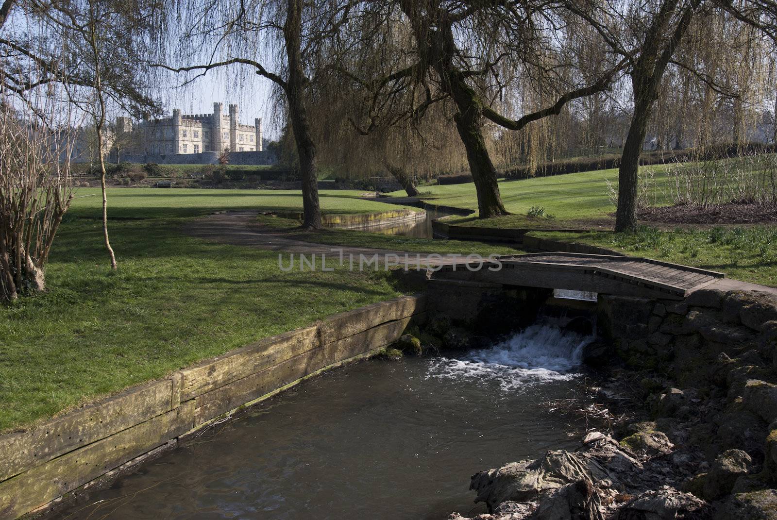 LeedsCastle with a stream and bridge in the foreground