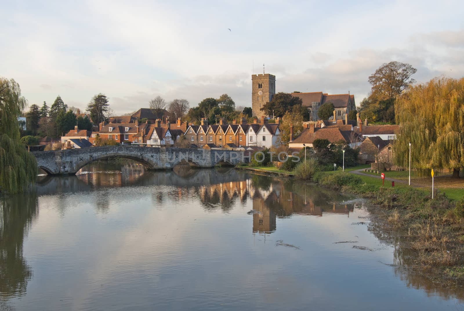 The medievil village of Aylesford with reflections in the river in the foreground