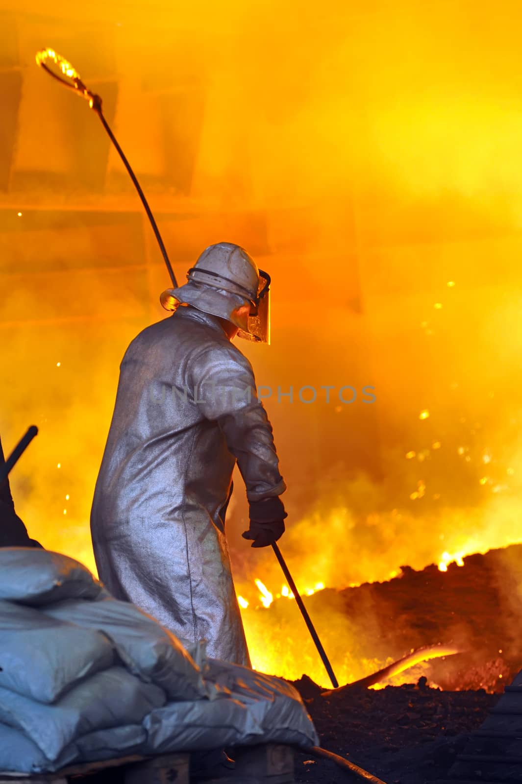 worker with hot steel  by mady70
