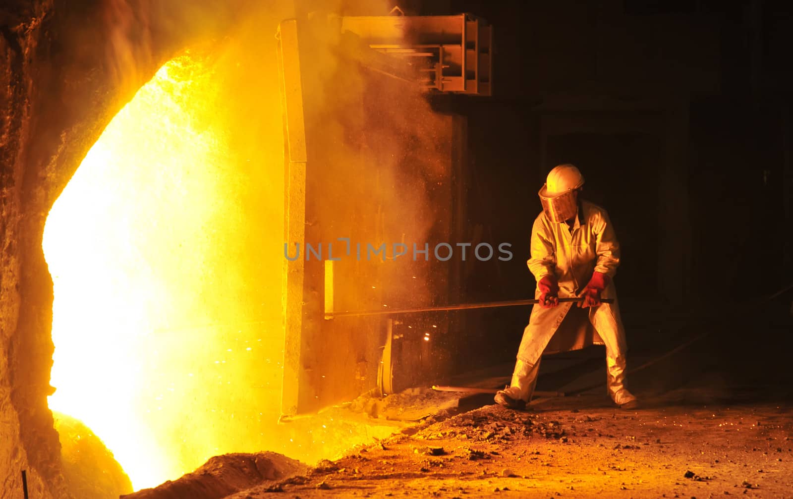 worker takes a sample at steel company  by mady70
