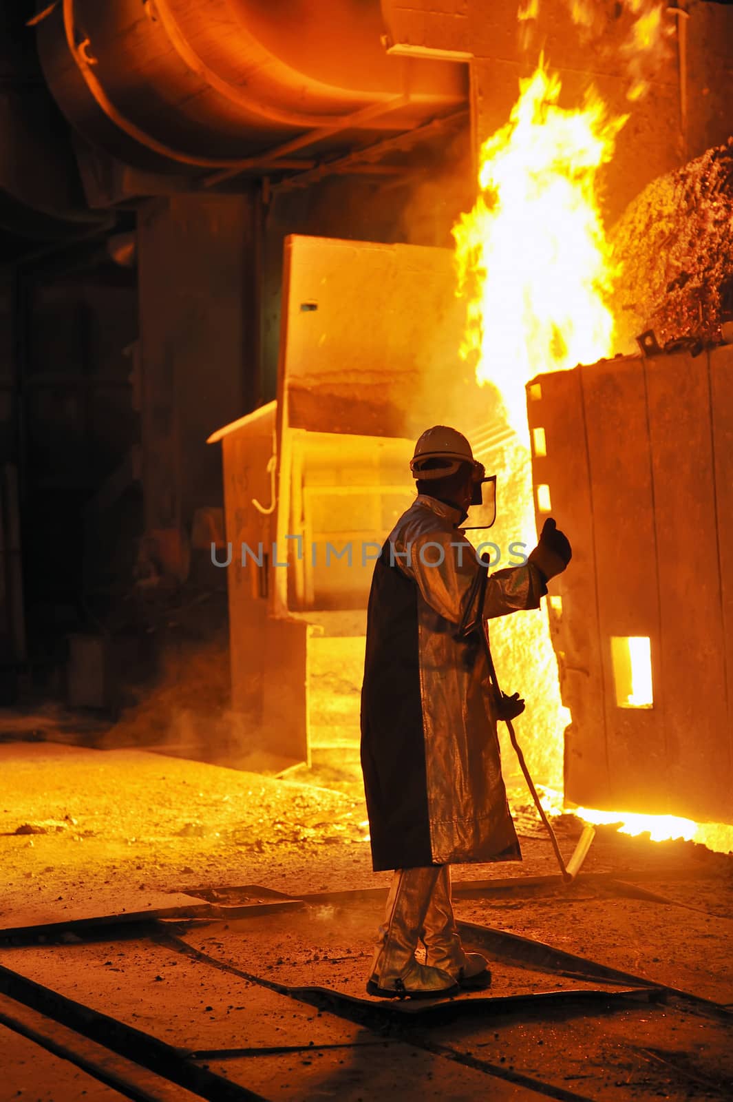 worker with hot steel 