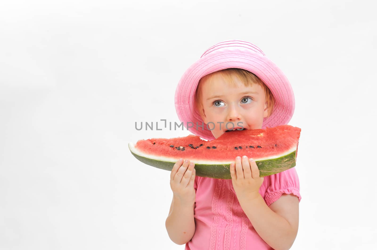 child  eating watermelon
