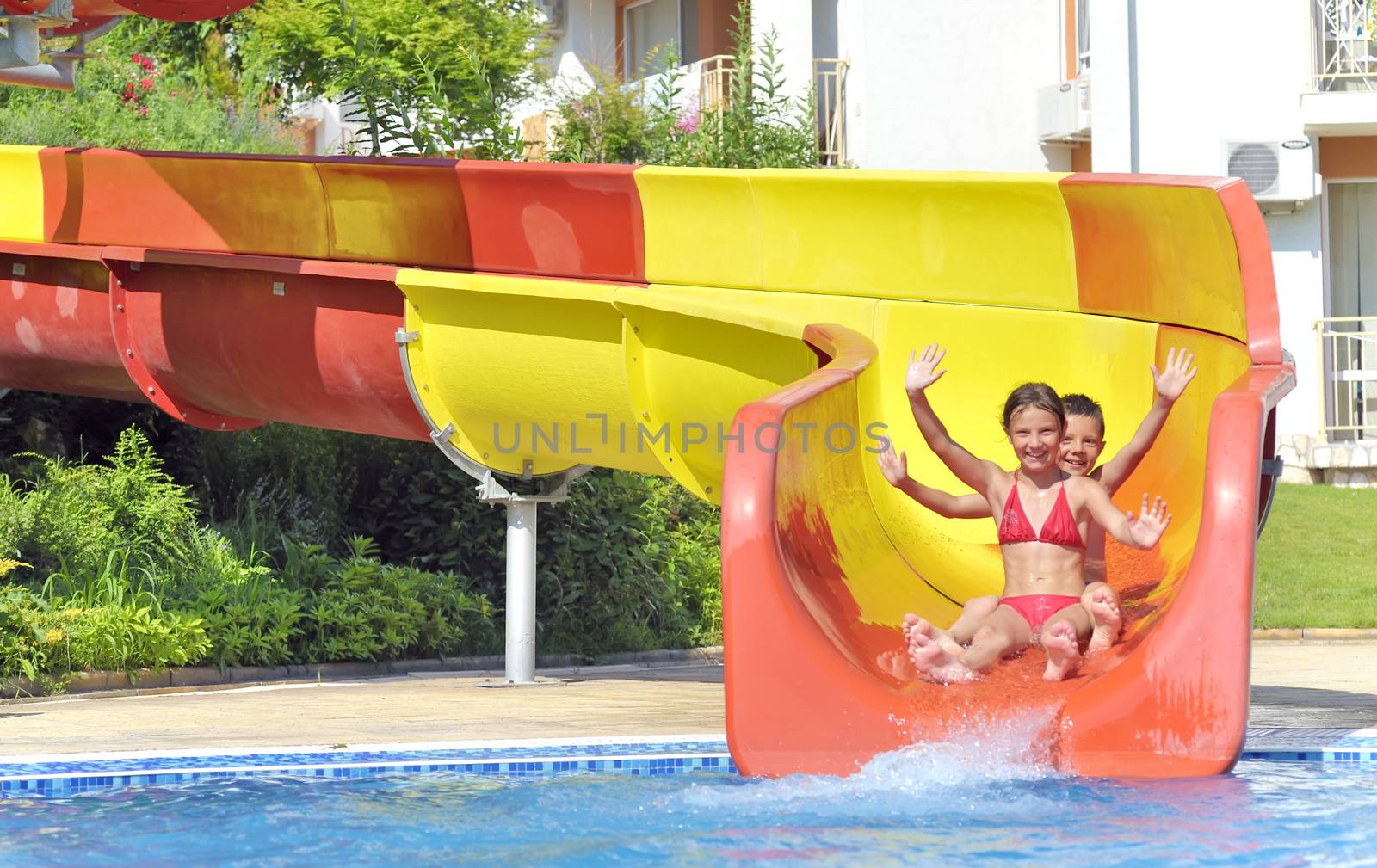 Children on water slide