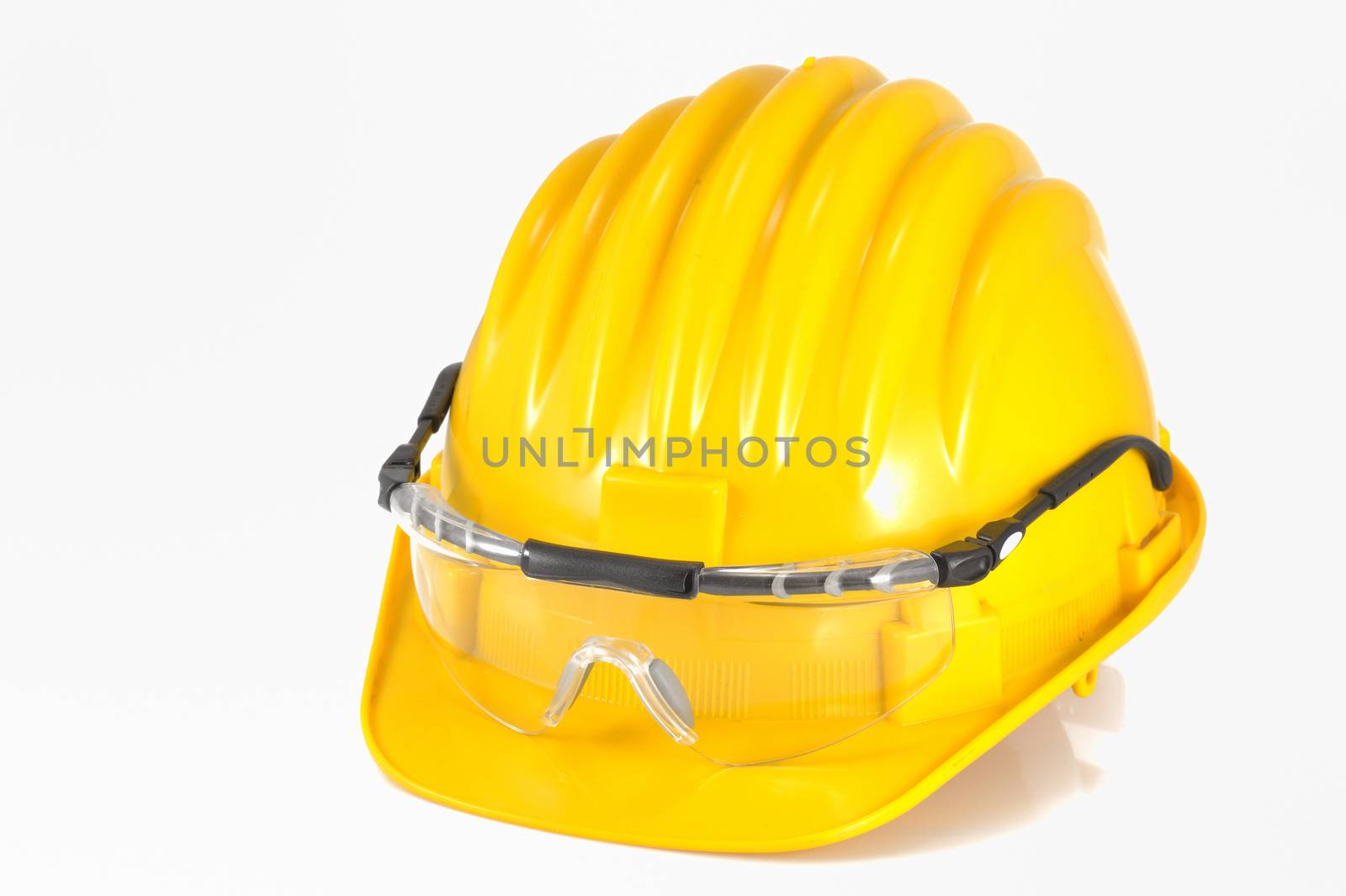 Yellow helmet isolated and glasses