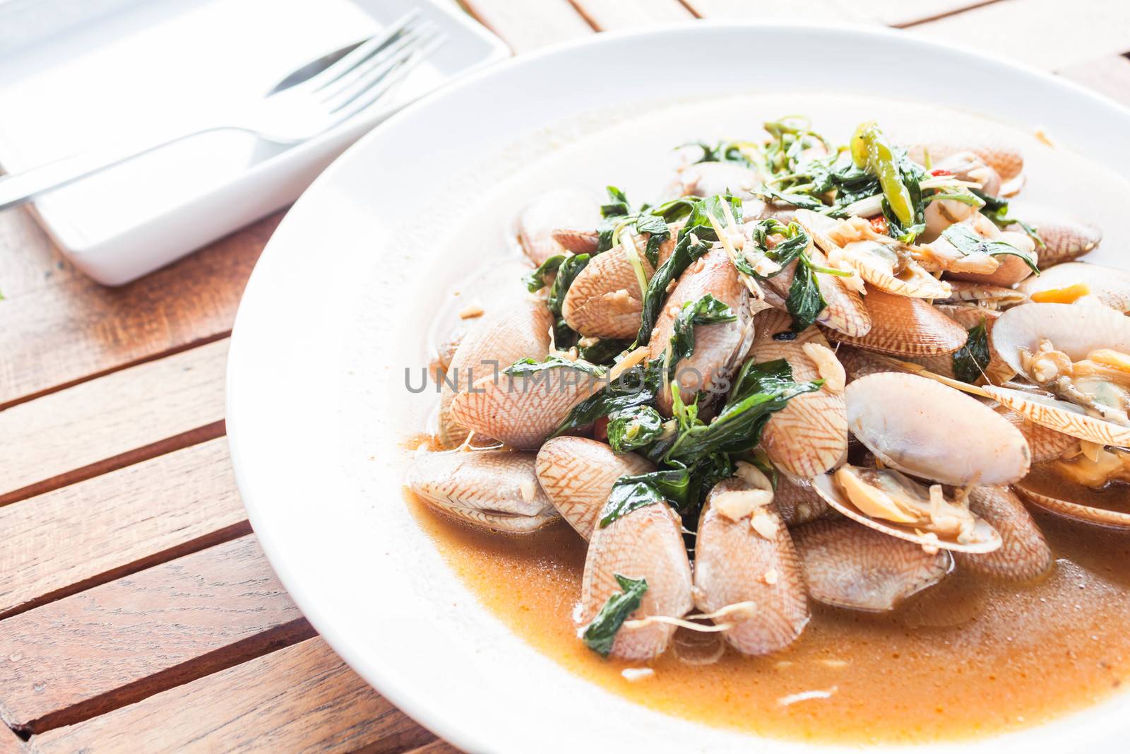 Stir fried clams with roasted chili paste, thai meal