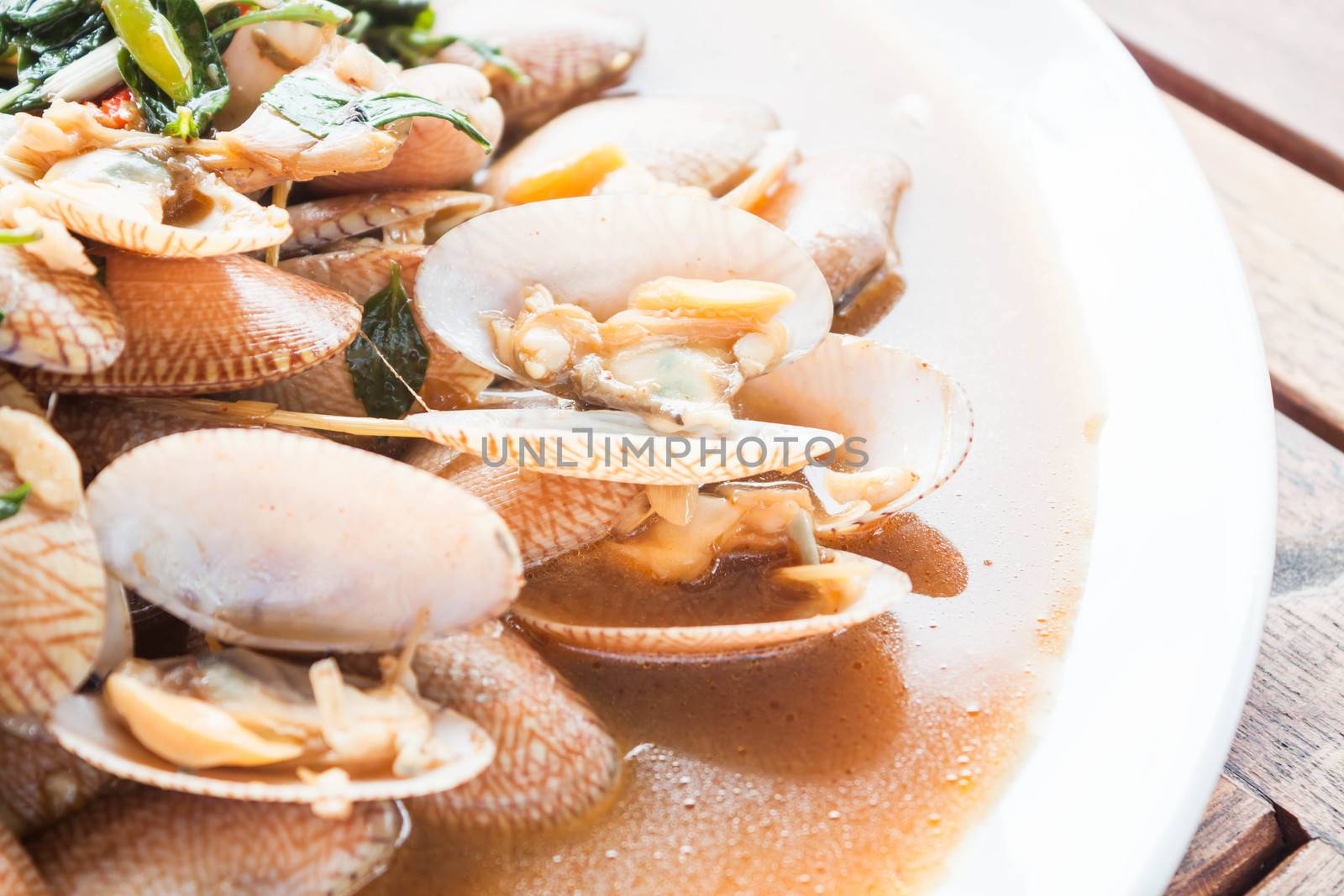 Stir fried clams with roasted chili paste, thai cuisine