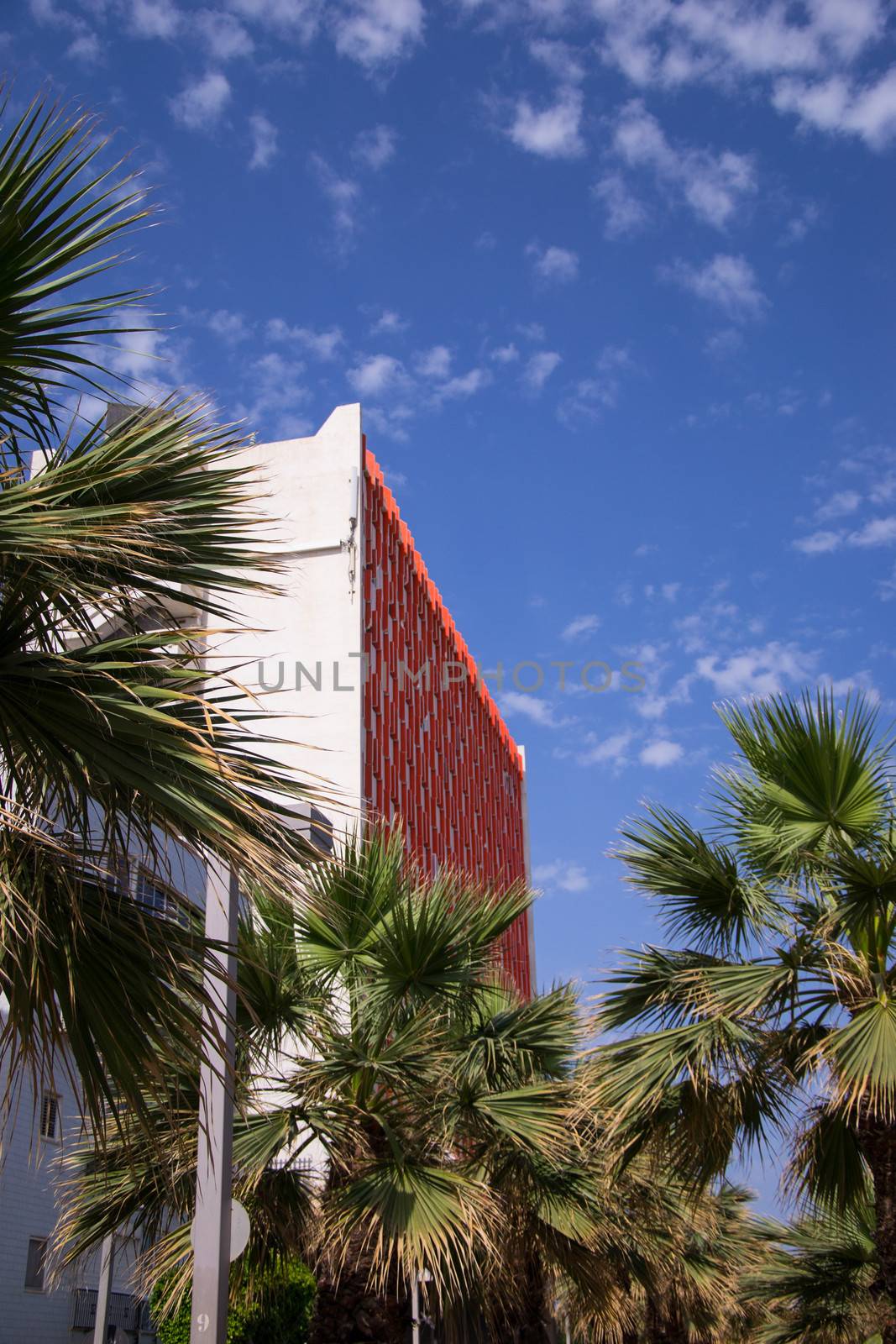 Building against cloudy blue sky