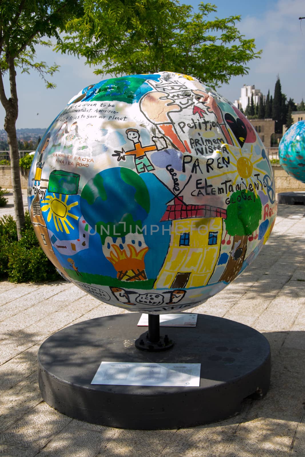 A globe statue  and some of the surroundings of Jerusalem