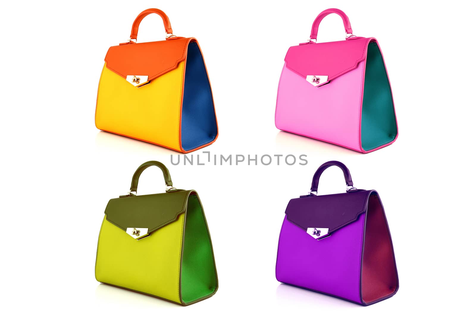 Set of multicolored female bags on a white background