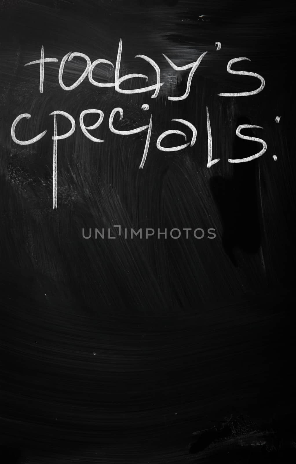 "Today's specials" handwritten with white chalk on a blackboard
