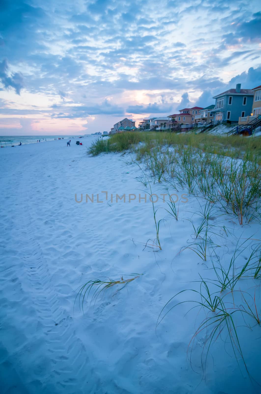 sunset on florida beach with white sand and blue sky by digidreamgrafix