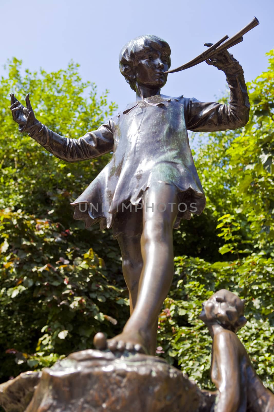 The famous Peter Pan statue in Kensington Gardens, London.