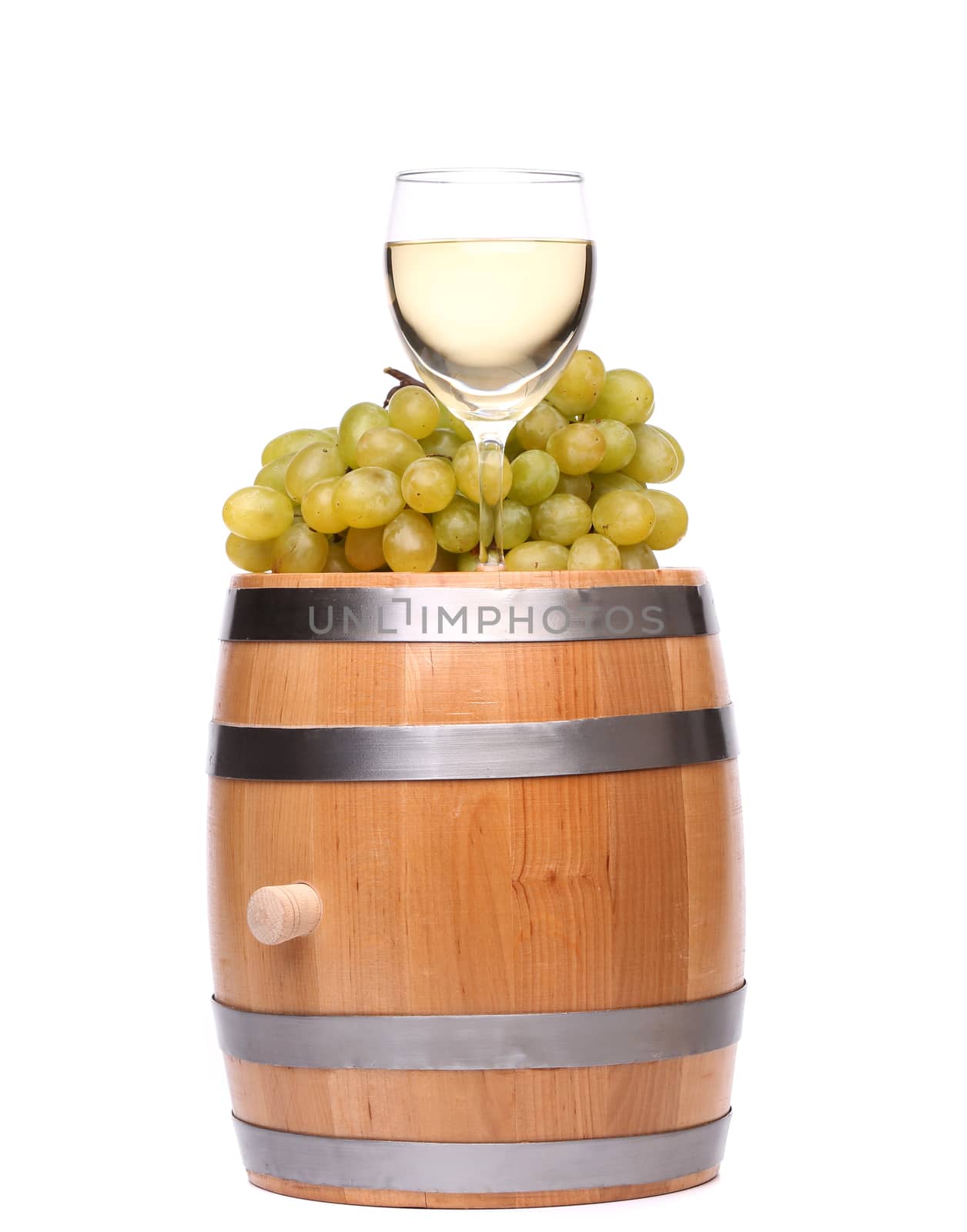 barrel, ripe grapes and glass of wine