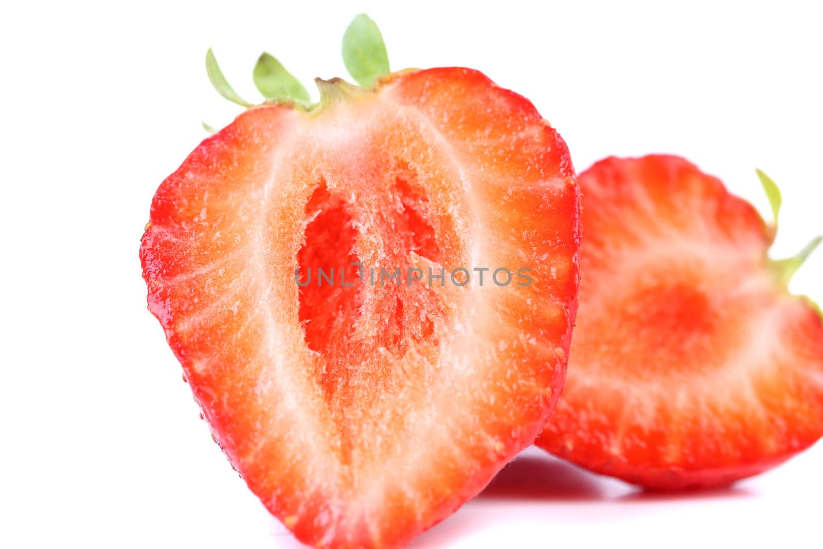 Fresh strawberry on a white background. Close up.