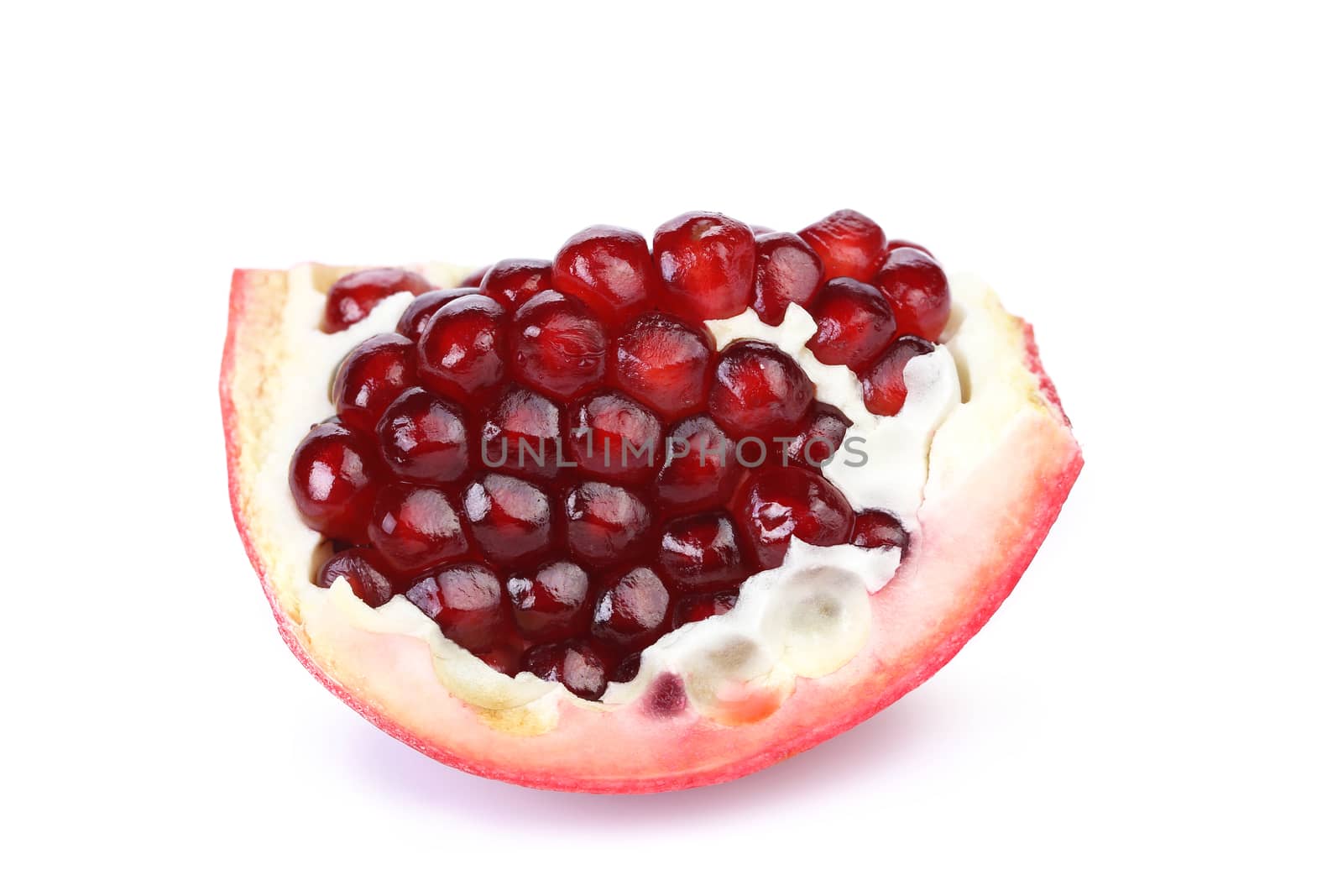Pomegranate slice isolated on white, clipping path included