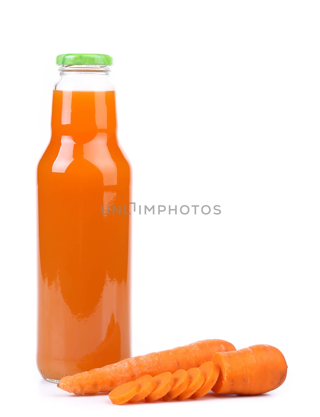 Slices raw carrot and juice isolated on white background