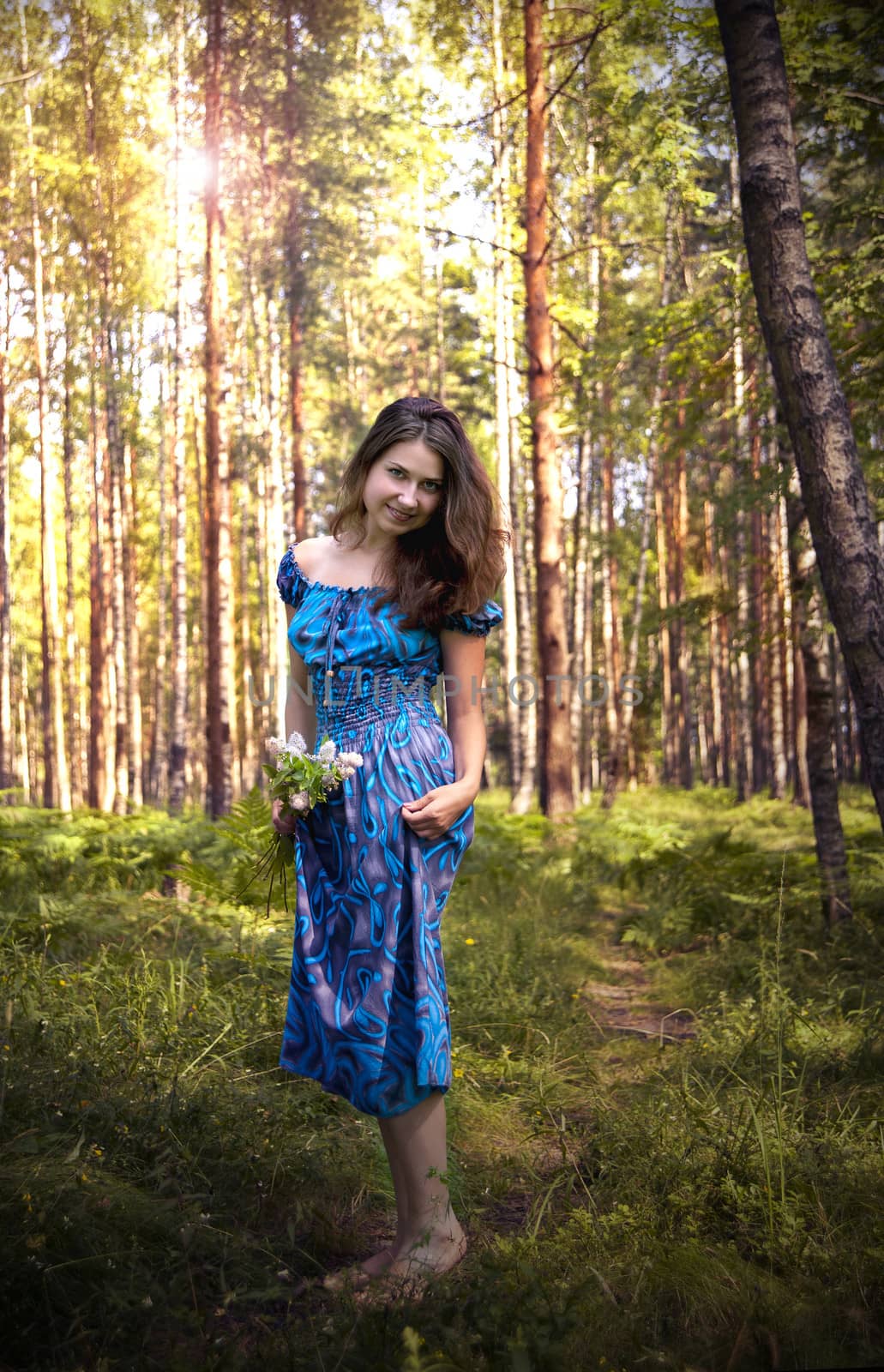 in the morning in the forest beautiful woman