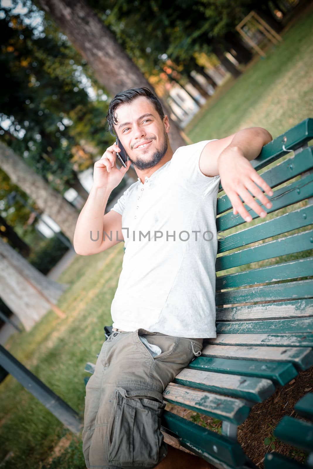 stylish man on the phone by peus
