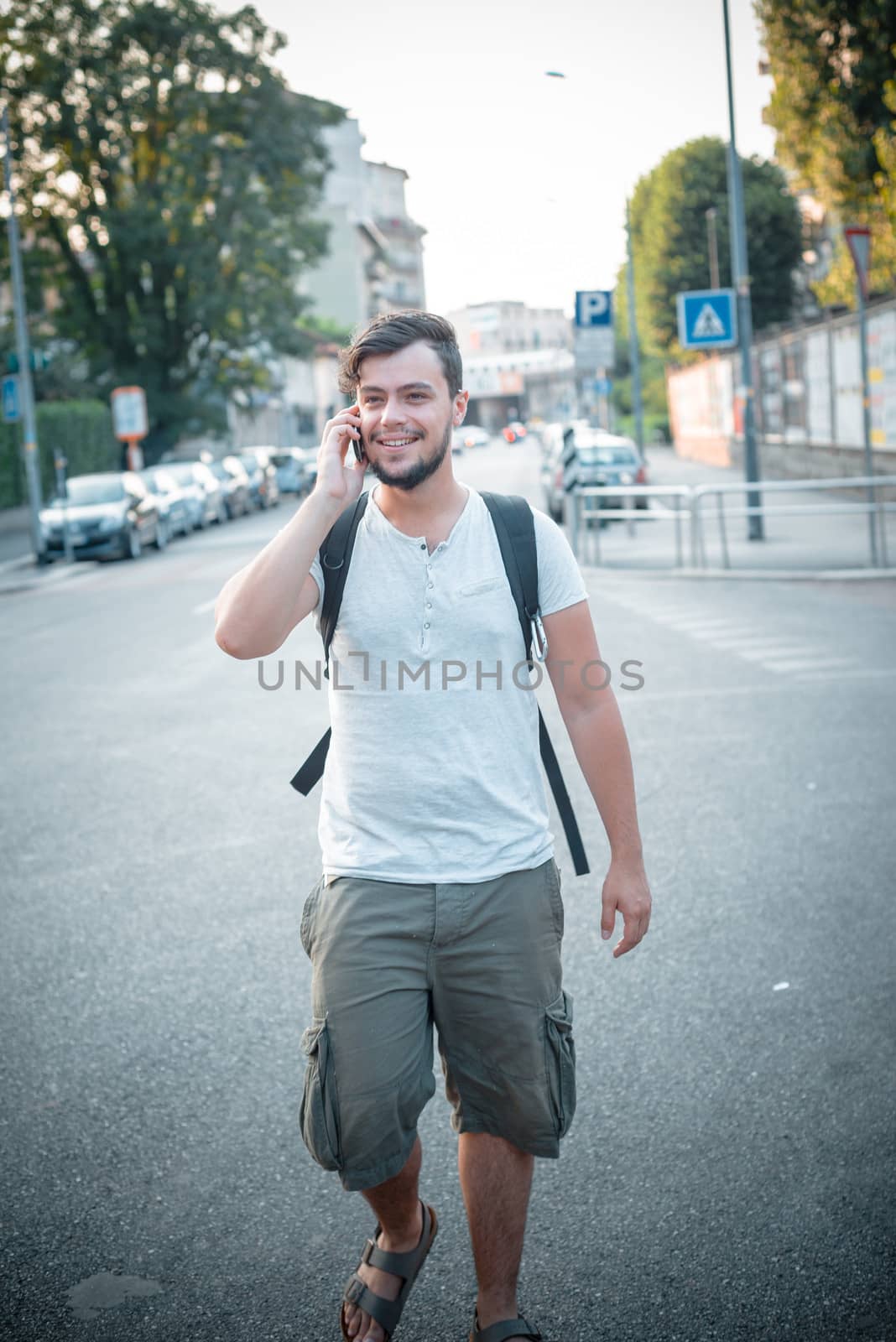 stylish man on the phone by peus