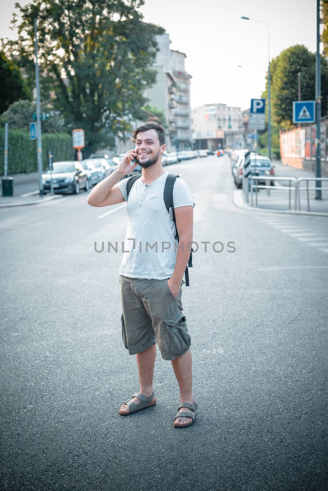 stylish man on the phone at the street
