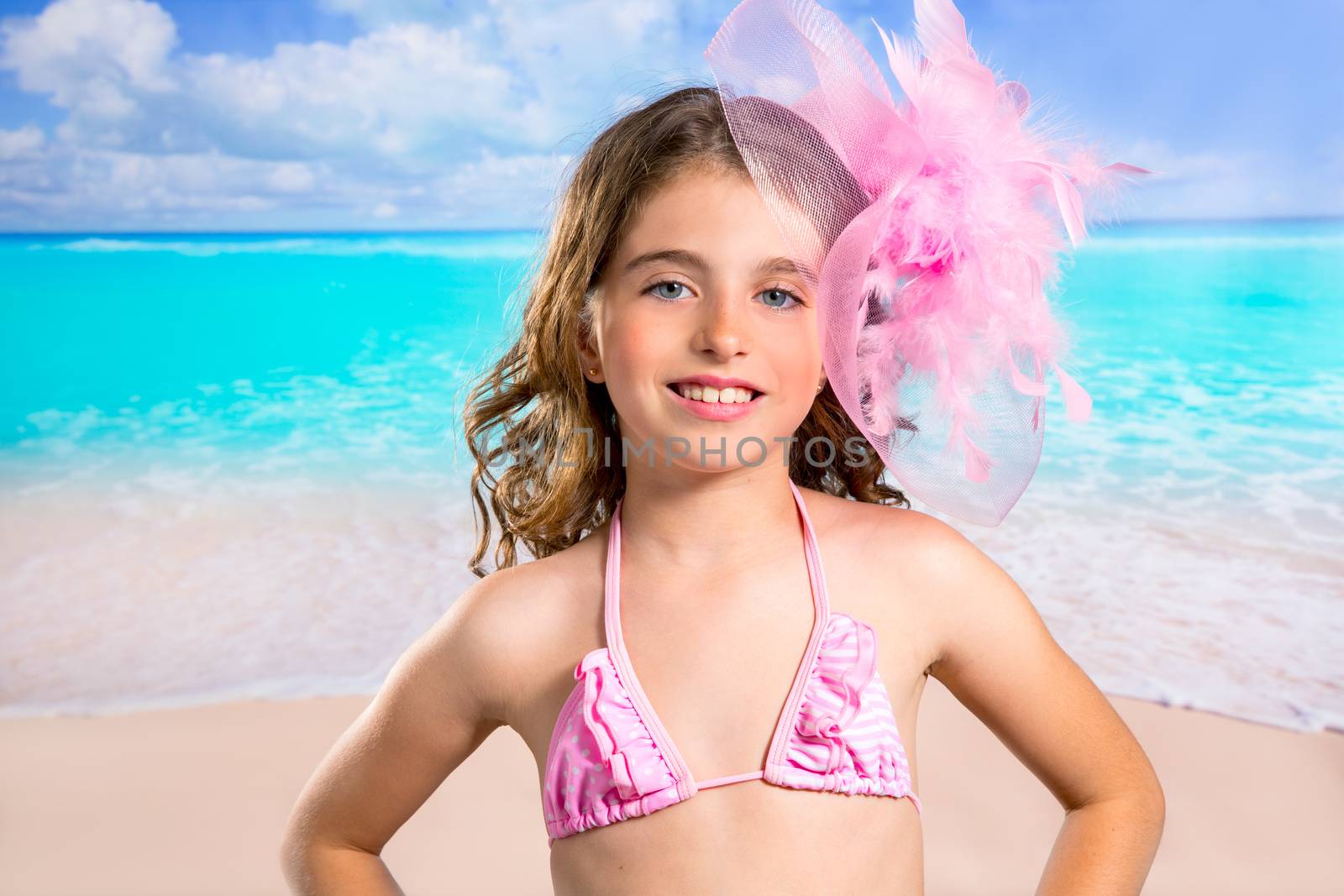 Children fashion girl in tropical turquoise beach vacations by lunamarina